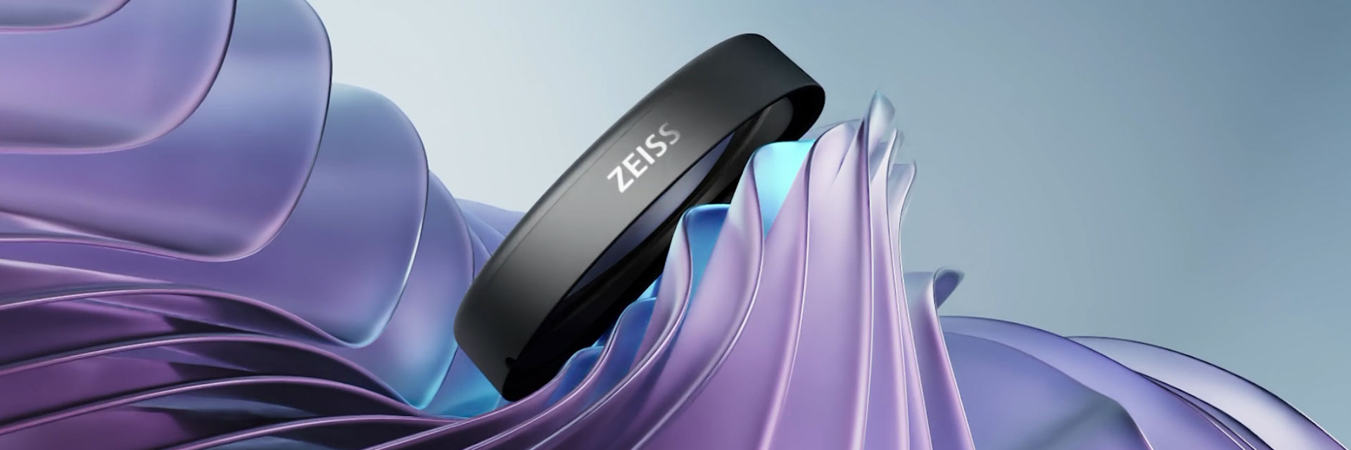 A closeup of the side of the ZEISS Optical Inserts for Apple Vision Pro, showing the ZEISS logo.