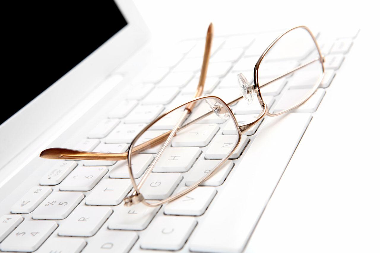 Spectacle lenses on computer keyboard