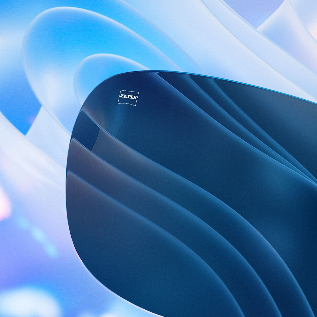 A CGI representation of a tinted lens is shown effectively blocking the glare visible in the background