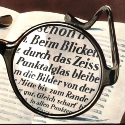 An image of an old advertisement for ZEISS Punktal lenses showing clear vision through the entire lens. This was revolutionary in 1912. 